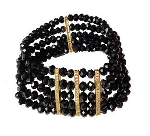 Bracelet- 5 rows of black crystal beads with 4 gold rhinestone bars