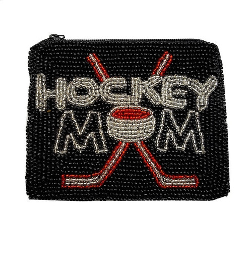 B/W Hockey Mom, with hockey sticks, black background