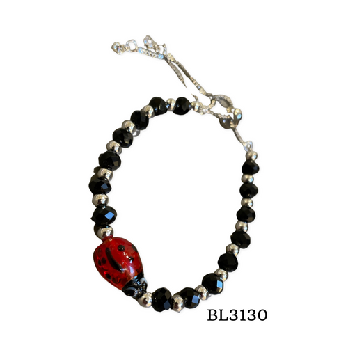 Bracelet-black crystal w silver beads mid lady bug pull cord