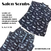 Flat lay of lash print scrubs jogger pants and matching scrub top set
