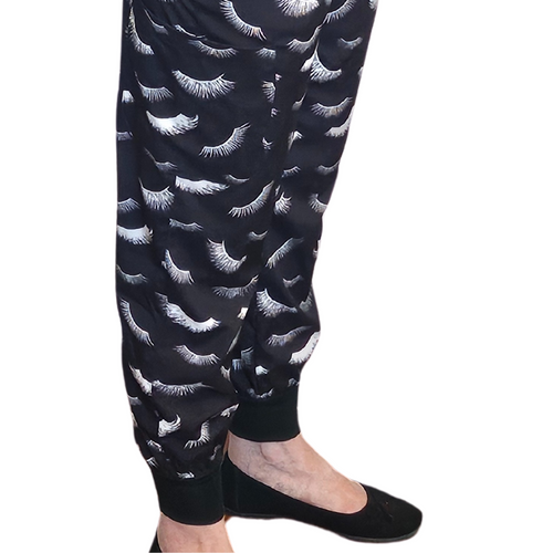 Elastic jogger ankle cuff on lash print scrub pants with comfortable fit