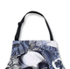 Adjustable strap detail on heavy-duty stylist apron for salon use