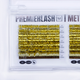 Close-up of gold tinsel fiber detail on lash extension