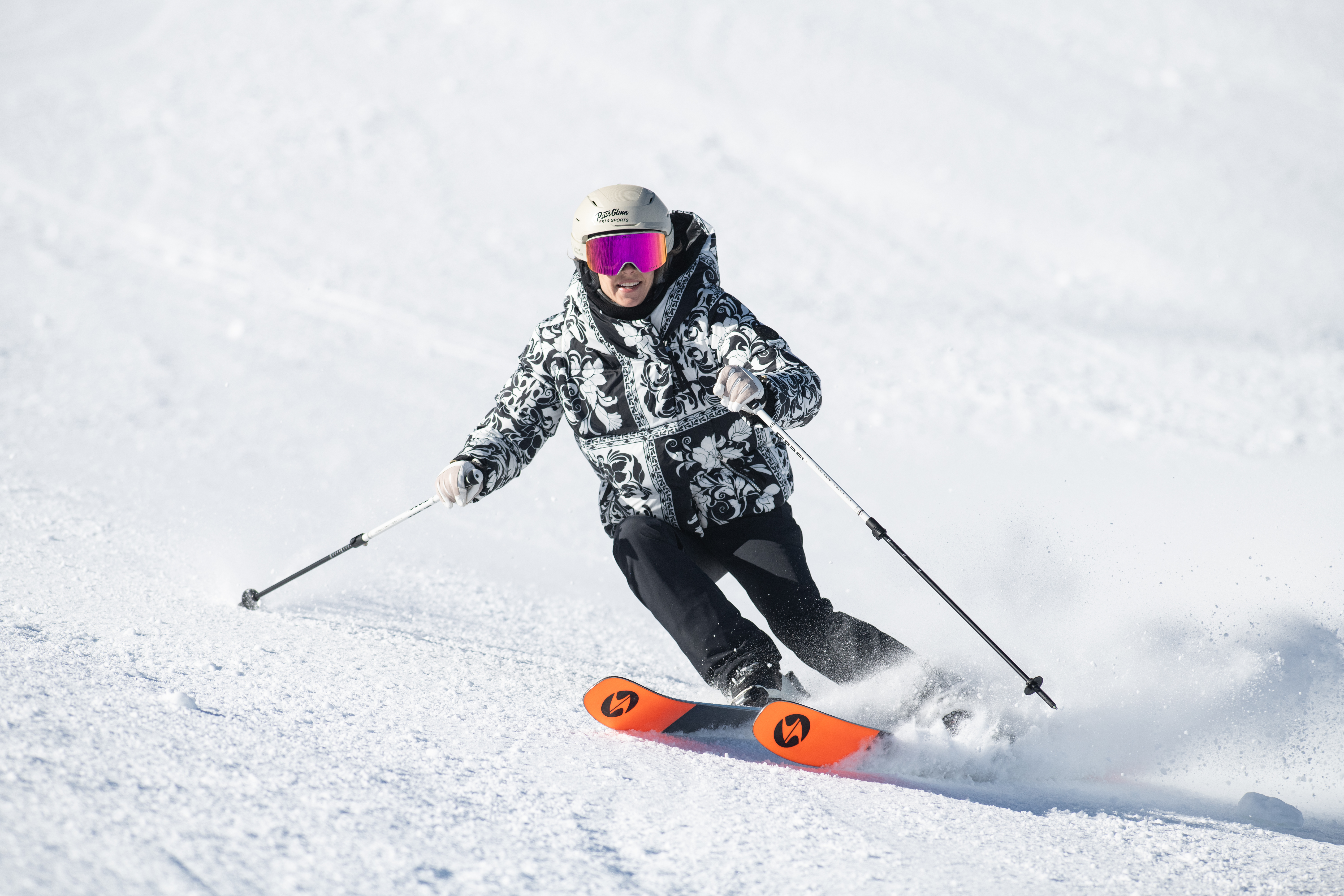 woman skiing down mountain