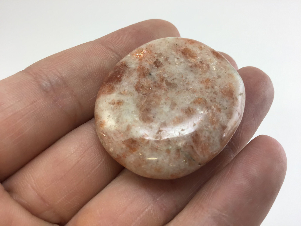 Sunstone palmstone, attract luck and good fortune, energy, smooth, crystal healing, reiki healing