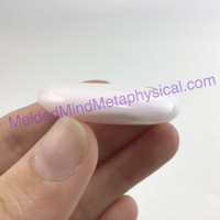 MeldedMind Fluorescent Pink Mangano Calcite Palm Stone 40mm Metaphysical Forgive