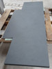 Black slate fireplace hearth with natural cleft top cut out for fireplace opening