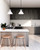 Halston 8-in Glossy Opal Glass/Matte Black 1 Light Pendant
