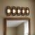 Cortez 26-in Antique White dimmable LED Wall/Vanity Light - Urban Bronze