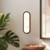 Evelyn 16-in Alabaster dimmable LED Bathroom Wall/Vanity Light with Brushed Gold Finish - Matte Black/Alabaster