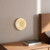 Stephord 4-in Metallic Brass/Frosted Glass LED Wall Sconce