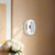 Pebble 8-in Glossy Black dimmable LED Wall Sconce - Chrome