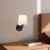 Scout 10-in Matte Black Wall/Vanity Light with Pleated White Linen Shade
