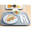 Olympia Kristallon Polypropylene Fast Food Tray Grey Large 450mm with foods on table.