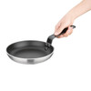 Essentials Non-Stick Teflon Frying Pan 280mm in hand.