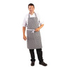 Chef wearing Whites Bib Apron Black and White Check.