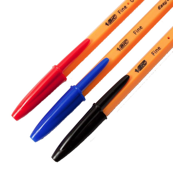 Three BIC Pens with Red Blue and Black ends next to each other