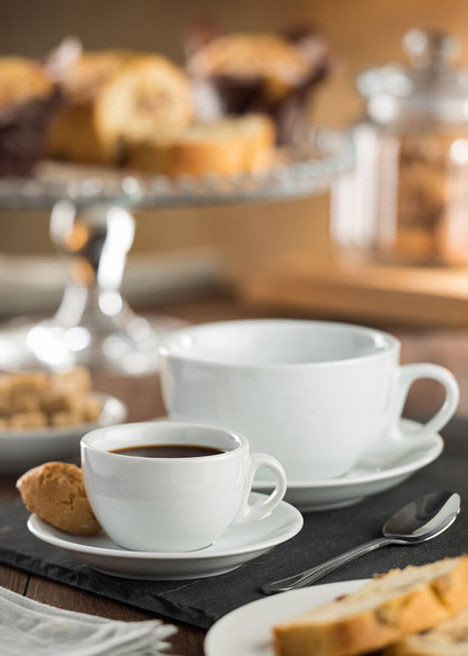 Two Titan-Italian Style Coffee Cup with content, saucer, teaspoon, and bread.