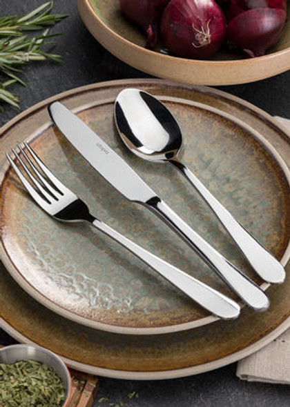 Gourmet Tea Spoon together with Fork and Knife place on a plate.