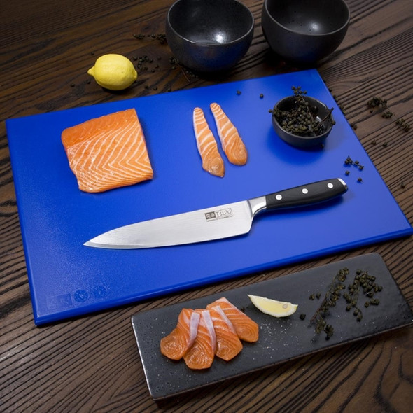 Full shot of High Density Chopping Board Blue colour with knife on the table.