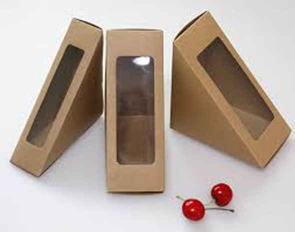 Full shot of 3 pcs Colpac Compostable Sandwich Box Kraft 125 x 77 x 72mm side by side with 2 cherries.