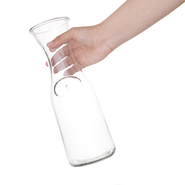 Hand holding Olympia Glass Carafe 1Ltr.