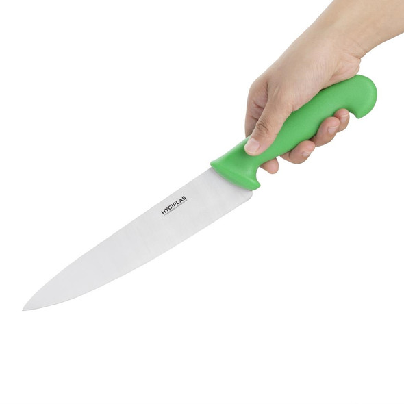 Hand holding Hygiplas Chef Knife Green 21.5cm.
