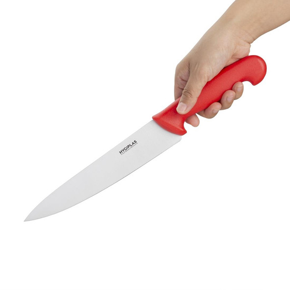 Hand holding Hygiplas Chefs Knife Red 21.5cm.