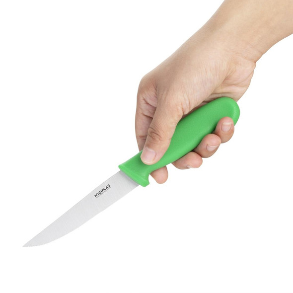 Hygiplas Serrated Vegetable Knife Green 10cm in hand.