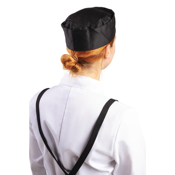 Lady Chef wearing Whites Chef Skull Cap Polycotton Black - M in Side view position.