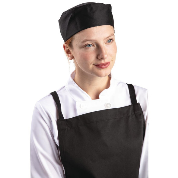 Side shot of Lady Chef wearing Whites Chef Skull Cap Polycotton Black - S.