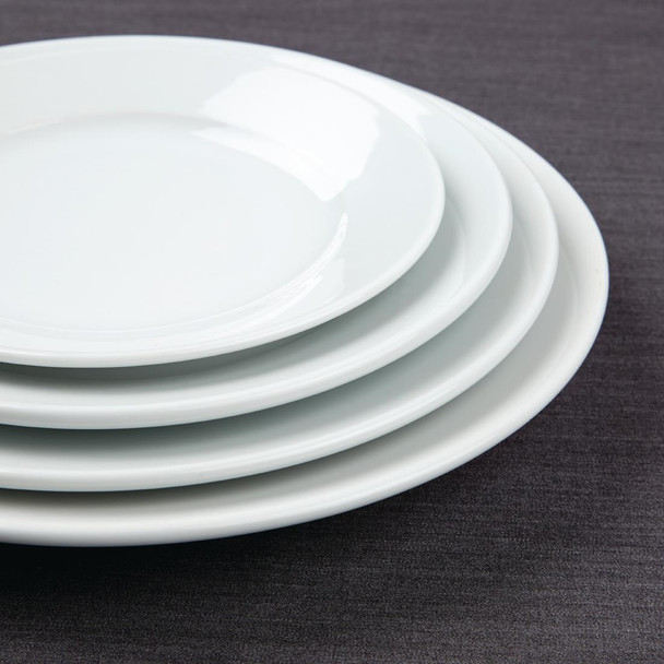 Side view of Olympia Athena Wide Rimmed Plates 228mm stacked together with other plates.