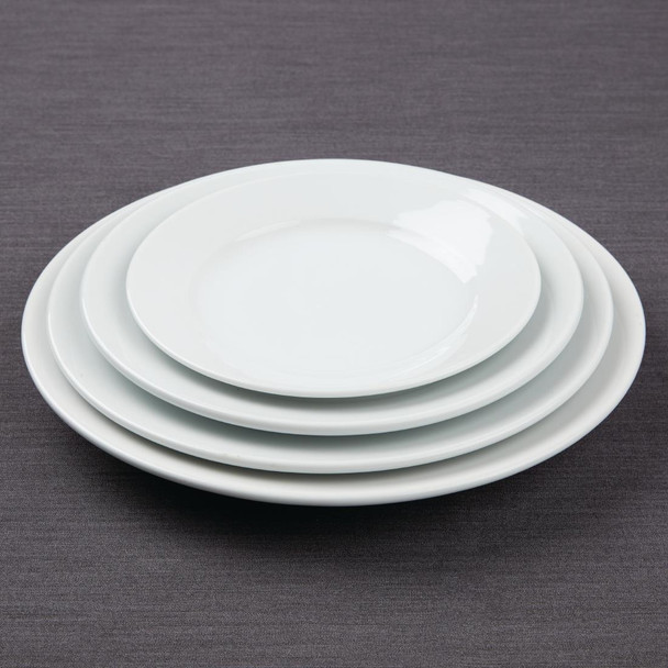 Olympia Athena Wide Rimmed Plates 228mm White stacked together with other plates.