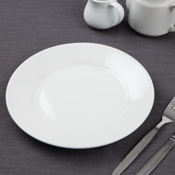 Olympia Athena Wide Rimmed Plates White 254mm with cutleries.