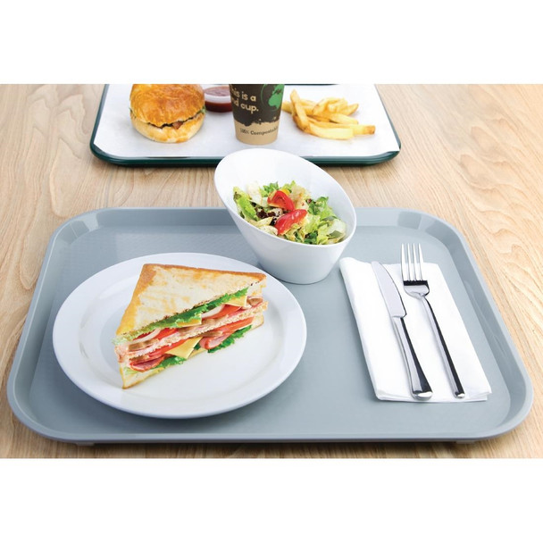 Olympia Kristallon Polypropylene Fast Food Tray Grey Large 450mm with foods on table.