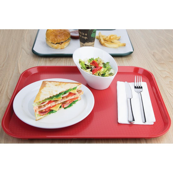 Olympia Kristallon Polypropylene Fast Food Tray Red Large 450mm with sandwiches on table.