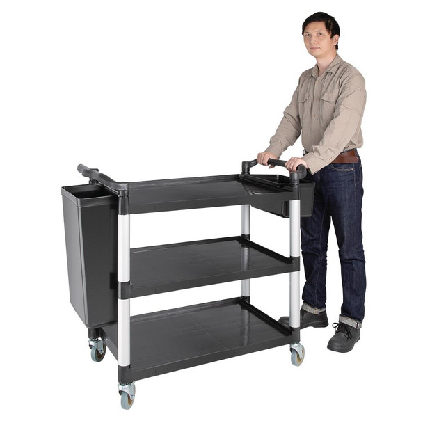 Man holding Vogue Polypropylene Mobile Trolley Large.