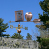 Book and Apple Weather vane