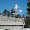 Cardinal Perched on a Heart Weathervane