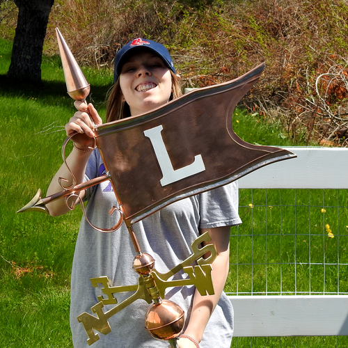 Jamey holding Fancy Banner Weathervane for Size Reference