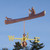 canoe and dog weathervane