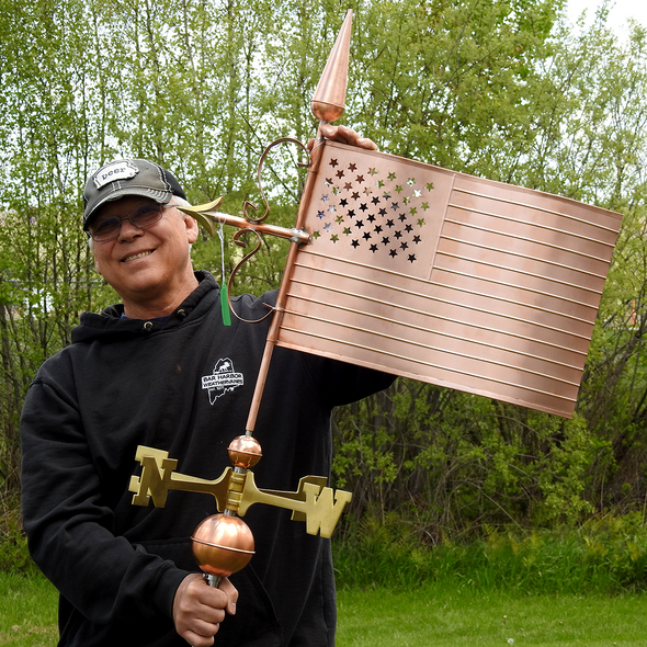 Todd Holding American Flag Weather Vane For Size Reference