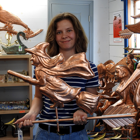 Riley holding Witch Weather Vane for Size Reference