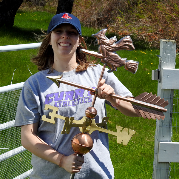 Jamey posing with a Witch weathervane for size reference