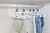 Quality Hangers 10 Pack Premium Skirt Hangers - Thin Space Saving Pant Hangers Set with Clamp, Shorts Hangers with Heavy Duty Locking Clasp, Multipurpose Jean Hangers Set - White
