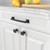 Amerdeco 10 Pack 1-1/3 Inch Matte Black Cabinet Pulls - Single Hole Round Drawer Knobs for Bathroom Cabinets and Dressers K0014
