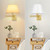 TRLIFE Dimmable Wall Sconce Plug in, Brushed Brass Wall Sconces Set of 2 Swing Arm Wall Lights with Plug in Cord and Dimmer On/Off Knob Switch, 11.8" Large White Fabric Shade(2 LED Bulbs Included)