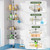 HAMITOR Shower Caddy Tension Pole: 4-Tier Rustproof Bathroom Corner Shelf Organizer for Renter - No Drill Large Shampoo Storage Rack - Adjustable 47-121" - Space Saving Bathtub Accessory - Silver Gray