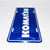 Komatsu Blue Embossed Metal License Plate Tag, Regular size