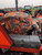 Durafit Seat Covers, KU02 MC2 Orange KUBOTA Models M5040-60/M6040-60/M7040-60/M8540-60/M9540-60 in Orange Camo Endura
